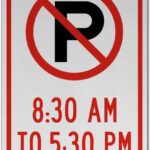 No Parking 8.30 am to 5.30 pm sign