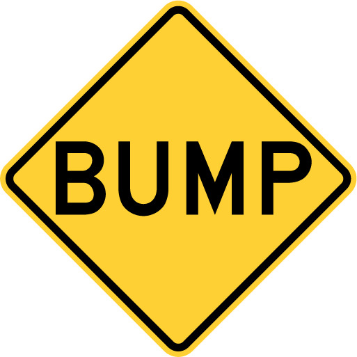 speed bump road sign