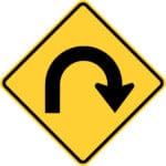 curve road sign hairpin