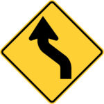 reverse curve road sign